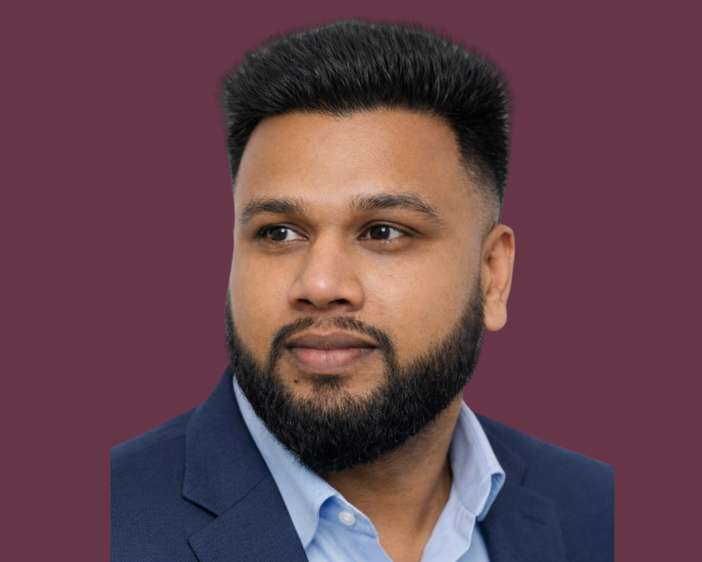 Portrait photograph of Maruf on a mauve background